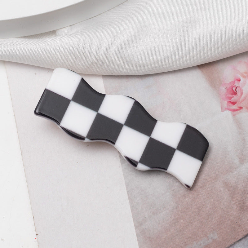 Checkers hair clip