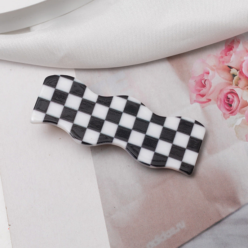 Checkers hair clip